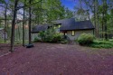 This spacious 4 bedroom, 3 bath home is located in the highly for sale in Pocono Pines Pennsylvania Monroe County County on GolfHomes.com
