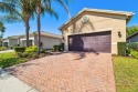 Welcome to Your Dream Home in Valencia Lakes - Where Luxury for sale in Wimauma Florida Hillsborough County County on GolfHomes.com