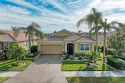 This exquisite residence within River Strand Golf and Country for sale in Bradenton Florida Manatee County County on GolfHomes.com