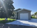 Beautiful 2BR/2BA + den with stunning golf course views! Enjoy for sale in Orlando Florida Orange County County on GolfHomes.com