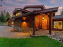 This exquisite home blends luxury with natural beauty, featuring for sale in Mccall Idaho Valley County County on GolfHomes.com