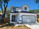 This beautiful and modern new home in Tampa with four bedrooms for sale in Tampa Florida Hillsborough County County on GolfHomes.com