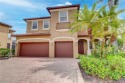 This spacious 5 bedroom plus den loft is available on an for sale in Naples Florida Collier County County on GolfHomes.com