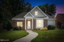 Step into easy one-level living in this 2023 carriage-style home for sale in Rocky Mount North Carolina Nash County County on GolfHomes.com
