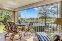 Enjoy stunning golf course and lake views from your 2nd floor for sale in Naples Florida Collier County County on GolfHomes.com