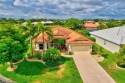 THE GOLF COMMUNITY HOME YOU'VE BEEN LOOKING FOR! - A 4 bedroom for sale in Lehigh Acres Florida Lee County County on GolfHomes.com