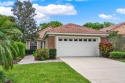 Welcome to 208 Lake Region Blvd! Tucked away in the gated for sale in Winter Haven Florida Polk County County on GolfHomes.com