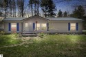 This 3-bedroom, 2-bath home in Kalkaska's Drydock community for sale in Kalkaska Michigan Kalkaska County County on GolfHomes.com