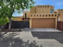 Come take a look! This cute 3 bedroom, 2 car garage townhouse is for sale in Albuquerque New Mexico Bernalillo County County on GolfHomes.com