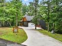 This stunning 4-bedroom, 4-bath home offers the perfect blend of for sale in Ellijay Georgia Gilmer County County on GolfHomes.com