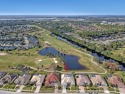 STUNNING VIEWS OF THE WATER, PRESERVE, AND GOLF COURSE! GAS for sale in Rockledge Florida Brevard County County on GolfHomes.com