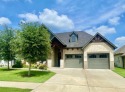 Gorgeous like-new home situated on the #3 Fairway of the Harbor for sale in Granbury Texas Hood County County on GolfHomes.com