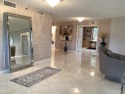 Custom-decorated 2nd-floor unit with neutral colors and two new for sale in Boca Raton Florida Palm Beach County County on GolfHomes.com