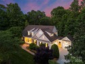 Indulge in serenity on 1.32 acres with lake/golf course views for sale in Mooresville North Carolina Iredell County County on GolfHomes.com