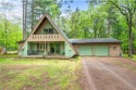 Welcome to this rustic retreat in the heart of Voyager Village for sale in Danbury Wisconsin Burnett County County on GolfHomes.com