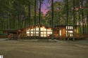 Anchor your Northern Michigan adventures at this architecturally for sale in Bellaire Michigan Antrim County County on GolfHomes.com
