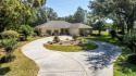 IT IS RARE TO FIND SUCH A CAPTIVATING HOME ON TRULY ONE OF BLACK for sale in Lecanto Florida Citrus County County on GolfHomes.com