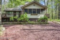 Discover the perfect blend of comfort and charm in this for sale in Pocono Pines Pennsylvania Monroe County County on GolfHomes.com