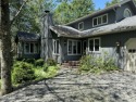 A must-see spacious home nestled in the gated Timber Trails for sale in Pocono Pines Pennsylvania Monroe County County on GolfHomes.com