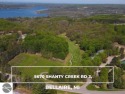 Welcome to The Legend Cottages where the view and condo living for sale in Bellaire Michigan Antrim County County on GolfHomes.com