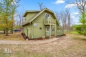 Set against the backdrop of Garland Golf Resort's Fountains for sale in Lewiston Michigan Oscoda County County on GolfHomes.com
