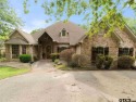 Beautiful custom golf course home in the private gated community for sale in Holly Lake Ranch Texas Wood County County on GolfHomes.com