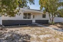 Welcome to this inviting 3 bed, 1.5 bath home situated on a for sale in St. Petersburg Florida Pinellas County County on GolfHomes.com