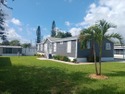 ONE OF A KIND! You OWN the land, no HOA. This 4 bedroom 2 bath for sale in Hobe Sound Florida Martin County County on GolfHomes.com