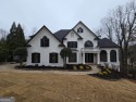 Experience luxurious golf course living in this meticulously for sale in Duluth Georgia Forsyth County County on GolfHomes.com