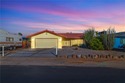 Welcome to 1135 Avenida Del Sol, a well-maintained and for sale in Bullhead City Arizona Mohave County County on GolfHomes.com