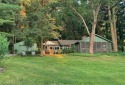 This charming, intimate  updated 3-bedroom lake view cottage is for sale in Mineral City Ohio Carroll County County on GolfHomes.com