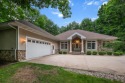 Impressive home with frontage on the 18th hole of St. Ives Golf, Michigan