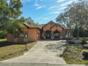 LUXURIOUS STYLE is apparent when you see this 2000 built 3/3/2 for sale in Ridge Manor Florida Hernando County County on GolfHomes.com