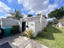 Discover your dream home in this stunning corner unit for sale in Hialeah Florida Miami-Dade County County on GolfHomes.com