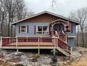 Remodeled and updated inside and out, this 4 bedroom, 3 bathroom for sale in Beech Mountain North Carolina Watauga County County on GolfHomes.com
