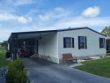 Air conditioned lanai & screened in porch are 2 ways to enjoy for sale in Leesburg Florida Lake County County on GolfHomes.com