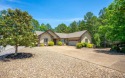 Enjoy amazing views and an unbeatable location on the green of for sale in Hot Springs Village Arkansas Saline County County on GolfHomes.com