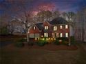 Welcome home to this timeless brick traditional nestled at the for sale in Acworth Georgia Cobb County County on GolfHomes.com