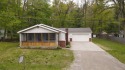 Amazing remodel just completed on this 4 bed 2 bath home. 2 car for sale in Houghton Lake Michigan Roscommon County County on GolfHomes.com