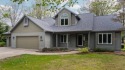 Welcome to this impeccably maintained ranch, ideally situated on for sale in Gaylord Michigan Otsego County County on GolfHomes.com