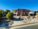 This well-maintained 2-bedroom, 2-bath manufactured home sits on for sale in Murrieta California Riverside County County on GolfHomes.com