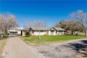Spacious 3-bed, 2-bath home nestled on 4 scenic acres in Sinton for sale in Sinton Texas San Patricio County County on GolfHomes.com