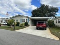 Welcome home to this warm and inviting TURNKEY house located on for sale in Winter Haven Florida Polk County County on GolfHomes.com