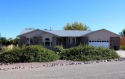 Spacious custom home with nice curb appeal backs to Desert Hawk for sale in Pueblo West Colorado Pueblo County County on GolfHomes.com