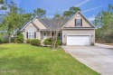 Welcome to your new home nestled on a wooded lot on the 13th for sale in Southport North Carolina Brunswick County County on GolfHomes.com
