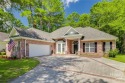 Welcome to this beautifully maintained BRICK 4-bedroom plus for sale in Savannah Georgia Chatham County County on GolfHomes.com