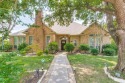 Beautifully remodeled 4-bed, 3-bath single-story home with for sale in Garland Texas Dallas County County on GolfHomes.com