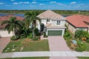 SPECTACULAR PANORAMIC LAKE AND PRESERVE VIEWS! SUNSET EXPOSURE! for sale in Venice Florida Sarasota County County on GolfHomes.com