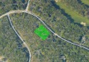 Escape to the beauty of Michaywe with this .74-acre wooded for sale in Gaylord Michigan Otsego County County on GolfHomes.com