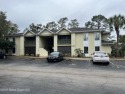 Welcome to this charming 2-bedroom, 2-bath ground floor condo for sale in Titusville Florida Brevard County County on GolfHomes.com